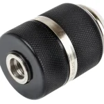 A close-up photo of a black INGCO S-CD-CHK-CDLI12325 cordless drill chuck. It has a cylindrical body with a ribbed texture for gripping and a gear on the bottom. The chuck has a keyway slot on the side and a screw in the center for tightening around a drill bit shank.